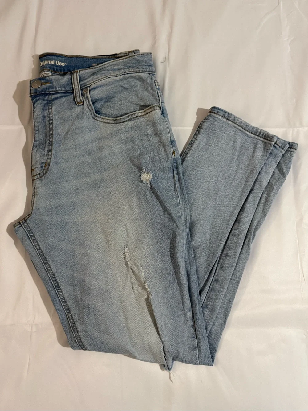 Original Use Slim Taper Distressed Light Wash Jeans